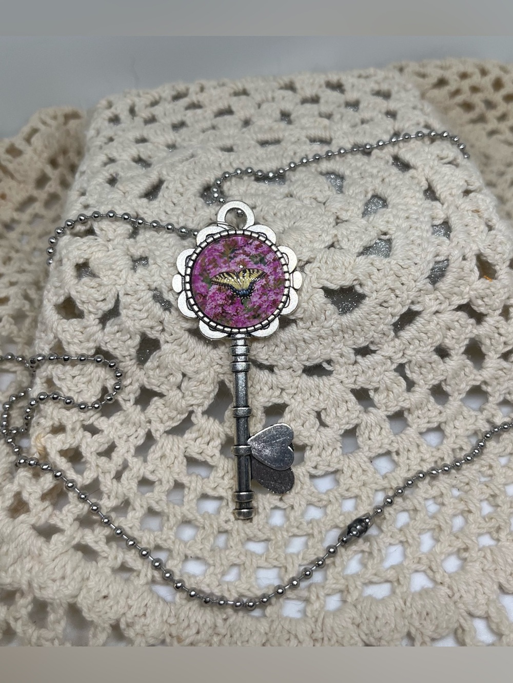 Handmade Silver Key Pendant Necklace with butterfly and pink flowers